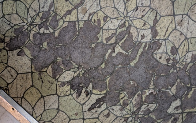 Close up of asbestos tile wearing out