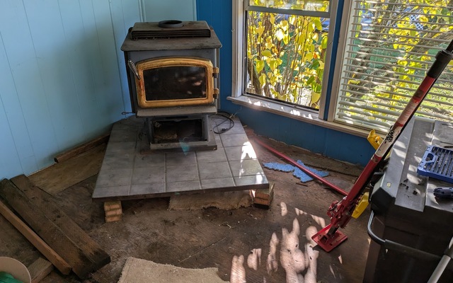 Fireplace lifted on temporary supports